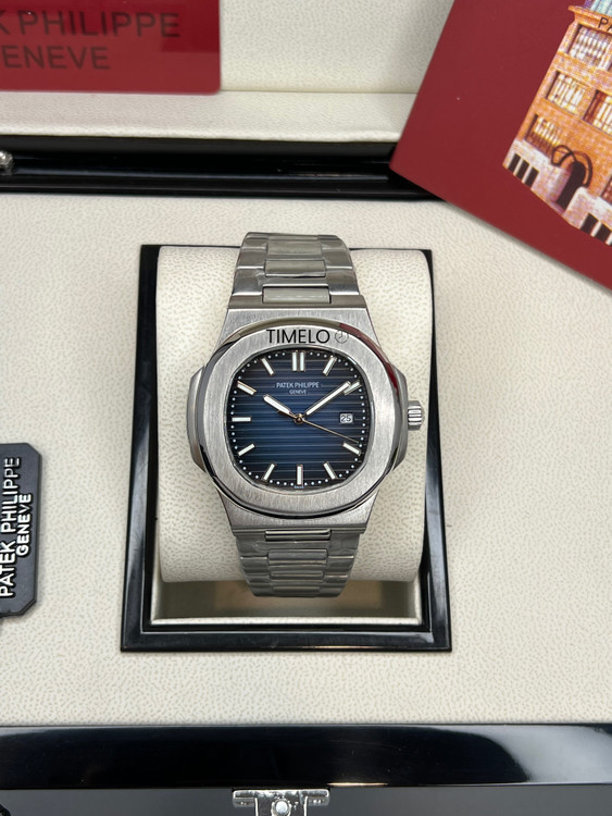 ساعت صفحه سرمه ای بند استیل نقره ای